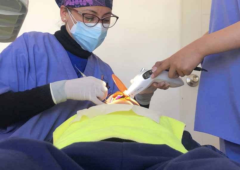 A volunteer in action at the dental clinic in Cusco